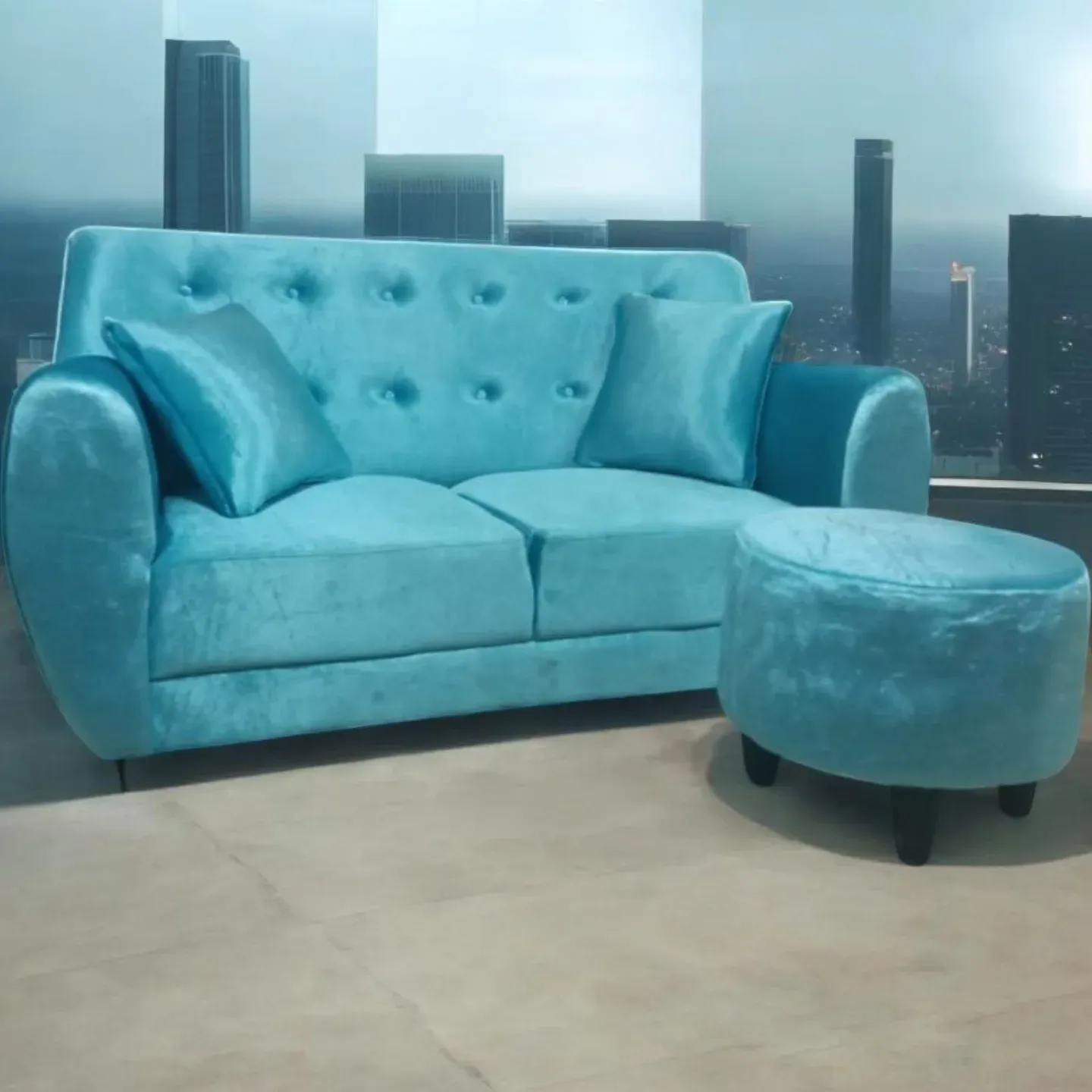 Sofa retro dua seater warna tosca dengan puff bulat buatan Bintang Jaya Bersama
